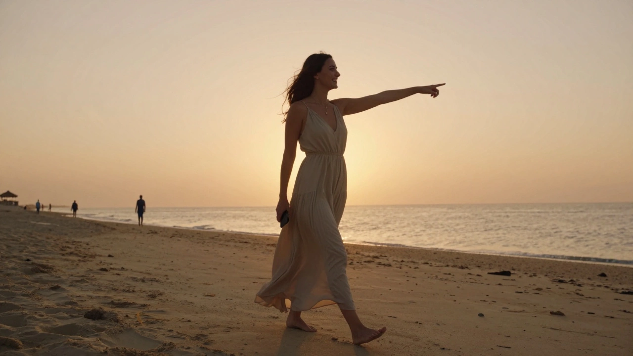 Simone walking barefoot on Jumeirah Beach at sunset, laughing naturally with the ocean behind her.
